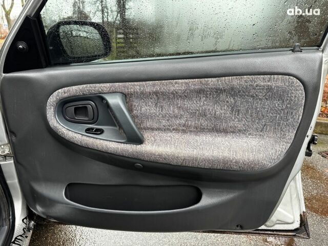 Сірий Деу Нексія, об'ємом двигуна 1.5 л та пробігом 159 тис. км за 2190 $, фото 23 на Automoto.ua