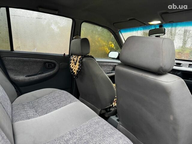 Сірий Деу Нексія, об'ємом двигуна 1.5 л та пробігом 159 тис. км за 2190 $, фото 22 на Automoto.ua