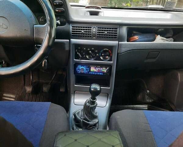 Серый Дэу Нексия, объемом двигателя 1.6 л и пробегом 150 тыс. км за 2700 $, фото 5 на Automoto.ua