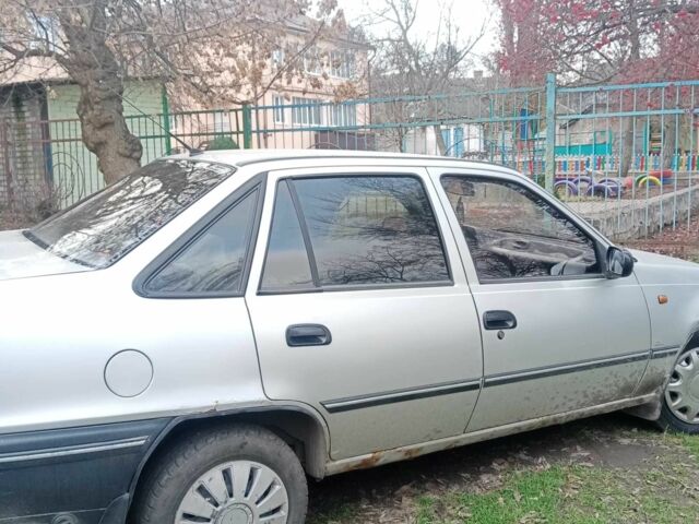 Серый Дэу Нексия, объемом двигателя 1.5 л и пробегом 257 тыс. км за 1650 $, фото 1 на Automoto.ua