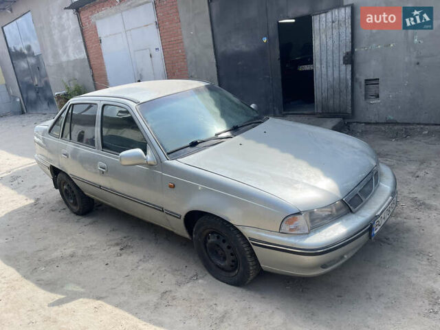 Серый Дэу Нексия, объемом двигателя 1.6 л и пробегом 295 тыс. км за 450 $, фото 4 на Automoto.ua