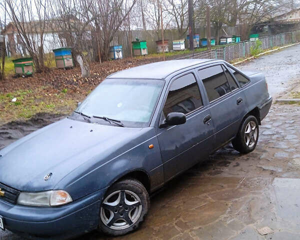 Серый Дэу Нексия, объемом двигателя 1.5 л и пробегом 300 тыс. км за 1250 $, фото 2 на Automoto.ua