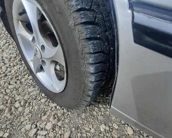 Сірий Деу Нексія, об'ємом двигуна 1.5 л та пробігом 250 тис. км за 1190 $, фото 14 на Automoto.ua