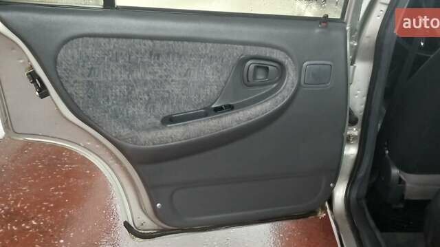 Сірий Деу Нексія, об'ємом двигуна 1.5 л та пробігом 95 тис. км за 1650 $, фото 22 на Automoto.ua