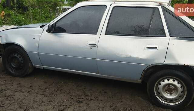 Серый Дэу Нексия, объемом двигателя 1.5 л и пробегом 334 тыс. км за 333 $, фото 2 на Automoto.ua