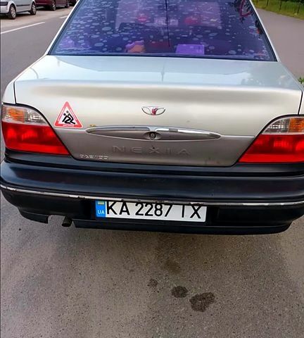 Сірий Деу Нексія, об'ємом двигуна 15 л та пробігом 317 тис. км за 2000 $, фото 3 на Automoto.ua