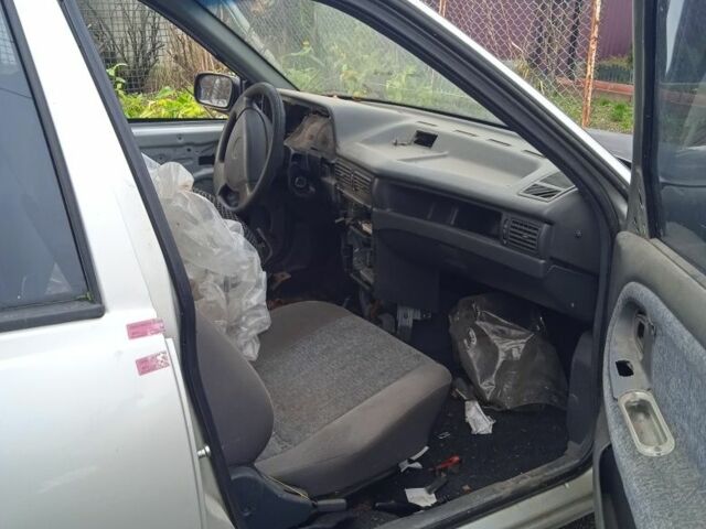 Сірий Деу Нексія, об'ємом двигуна 1 л та пробігом 288 тис. км за 355 $, фото 8 на Automoto.ua