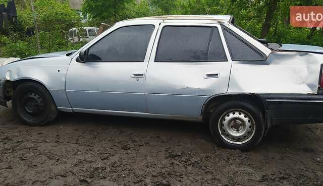 Серый Дэу Нексия, объемом двигателя 1.5 л и пробегом 334 тыс. км за 333 $, фото 3 на Automoto.ua