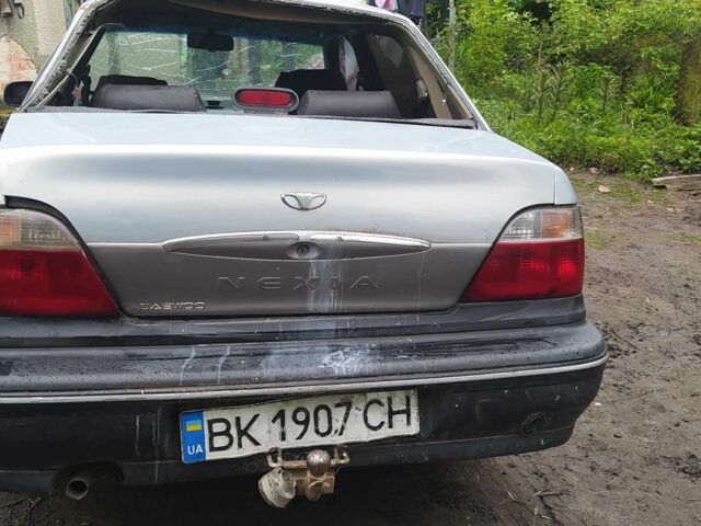 Серый Дэу Нексия, объемом двигателя 1.5 л и пробегом 334 тыс. км за 334 $, фото 4 на Automoto.ua