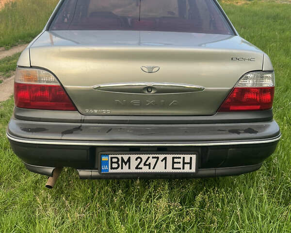 Сірий Деу Нексія, об'ємом двигуна 1.5 л та пробігом 125 тис. км за 1690 $, фото 3 на Automoto.ua
