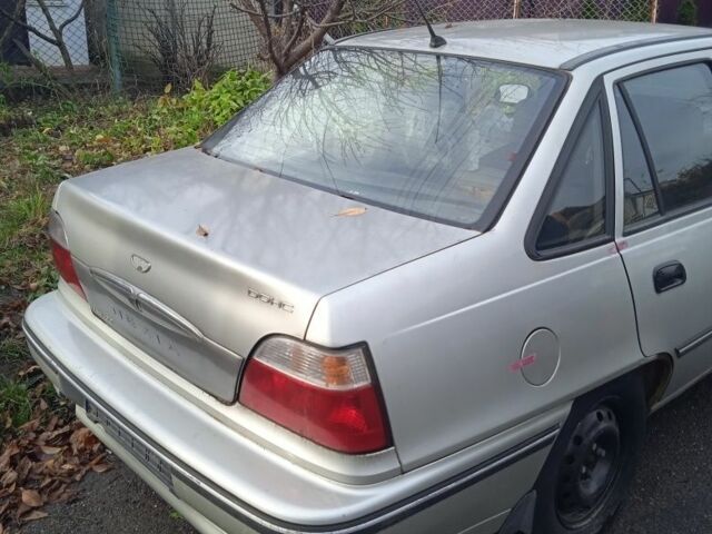 Сірий Деу Нексія, об'ємом двигуна 1 л та пробігом 288 тис. км за 355 $, фото 1 на Automoto.ua