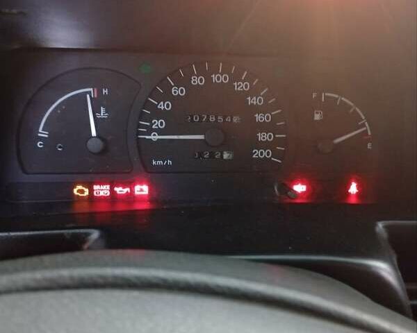 Серый Дэу Нексия, объемом двигателя 1.5 л и пробегом 205 тыс. км за 2100 $, фото 1 на Automoto.ua