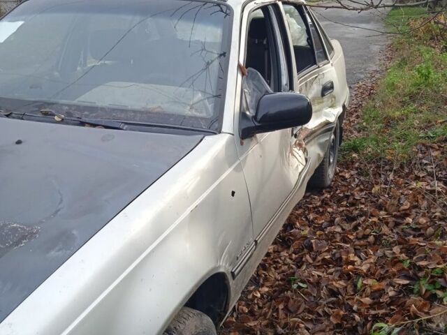 Сірий Деу Нексія, об'ємом двигуна 1 л та пробігом 288 тис. км за 355 $, фото 4 на Automoto.ua