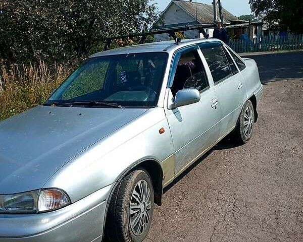 Сірий Деу Нексія, об'ємом двигуна 1.5 л та пробігом 157 тис. км за 2000 $, фото 2 на Automoto.ua