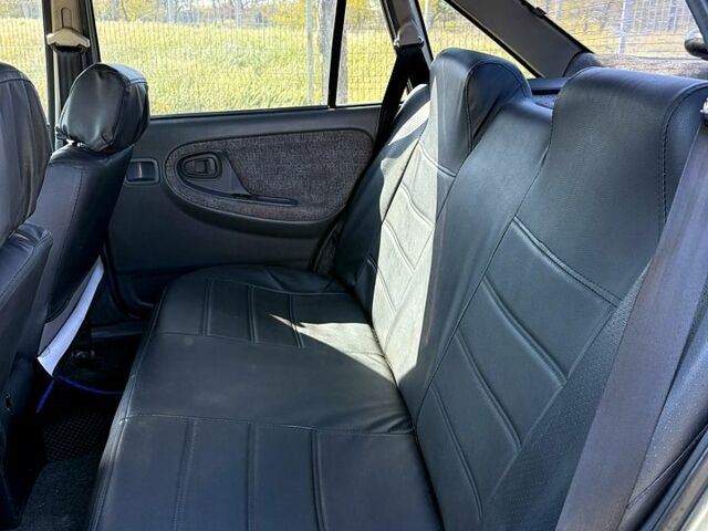 Сірий Деу Нексія, об'ємом двигуна 1.5 л та пробігом 294 тис. км за 1800 $, фото 8 на Automoto.ua