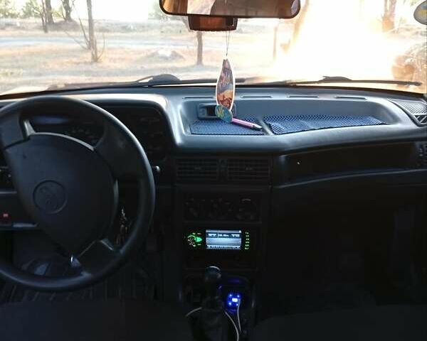 Серый Дэу Нексия, объемом двигателя 1.5 л и пробегом 205 тыс. км за 2100 $, фото 2 на Automoto.ua