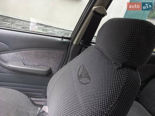 Серый Дэу Нексия, объемом двигателя 1.5 л и пробегом 153 тыс. км за 1900 $, фото 4 на Automoto.ua