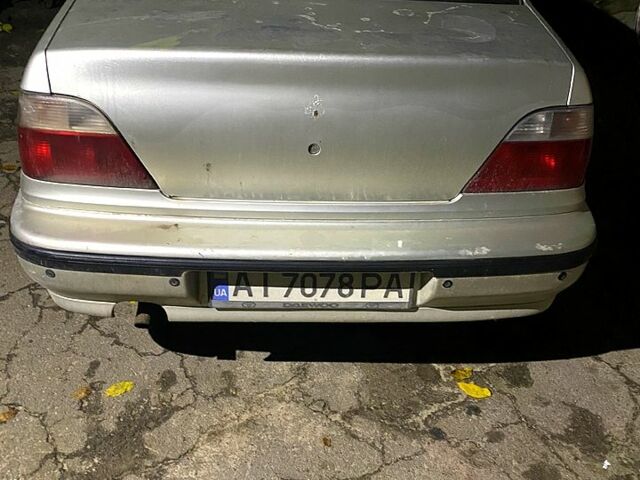Сірий Деу Нексія, об'ємом двигуна 1.5 л та пробігом 350 тис. км за 1000 $, фото 2 на Automoto.ua