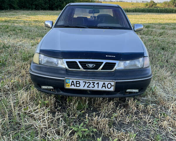 Серый Дэу Нексия, объемом двигателя 1.6 л и пробегом 250 тыс. км за 1999 $, фото 1 на Automoto.ua