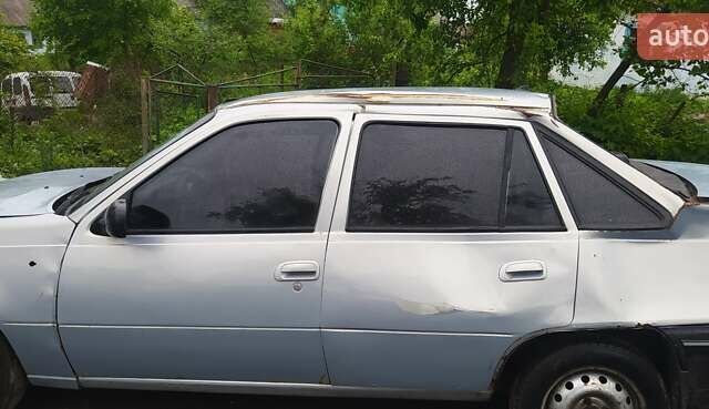 Серый Дэу Нексия, объемом двигателя 1.5 л и пробегом 334 тыс. км за 333 $, фото 6 на Automoto.ua