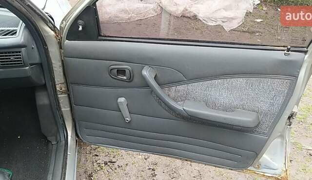 Серый Дэу Нексия, объемом двигателя 1.5 л и пробегом 334 тыс. км за 333 $, фото 24 на Automoto.ua