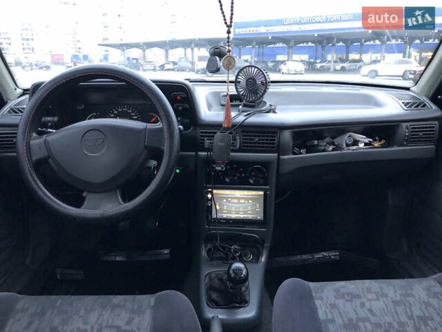 Сірий Деу Нексія, об'ємом двигуна 1.5 л та пробігом 330 тис. км за 1650 $, фото 14 на Automoto.ua