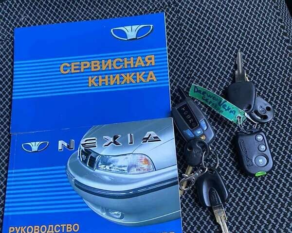 Сірий Деу Нексія, об'ємом двигуна 1.5 л та пробігом 87 тис. км за 2600 $, фото 12 на Automoto.ua