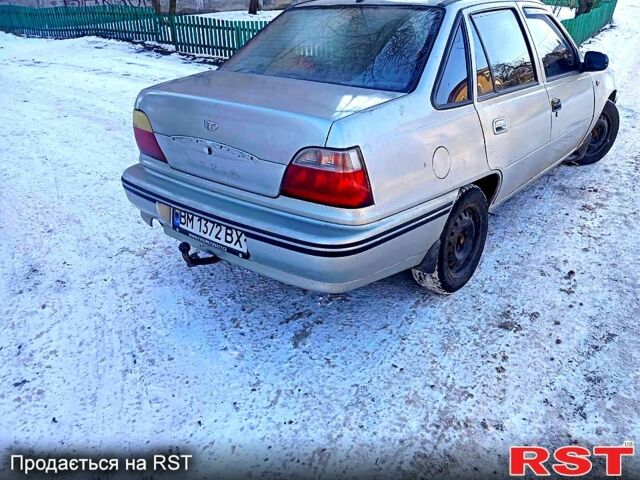 Серый Дэу Нексия, объемом двигателя 15 л и пробегом 210 тыс. км за 900 $, фото 2 на Automoto.ua