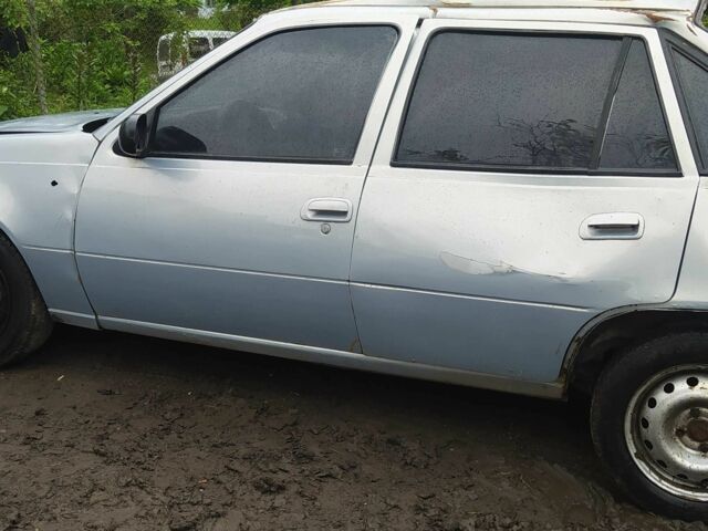 Серый Дэу Нексия, объемом двигателя 1.5 л и пробегом 334 тыс. км за 334 $, фото 1 на Automoto.ua