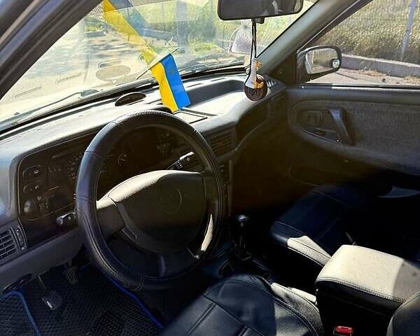 Серый Дэу Нексия, объемом двигателя 1.5 л и пробегом 294 тыс. км за 1800 $, фото 3 на Automoto.ua