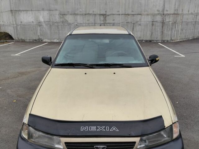 Сірий Деу Нексія, об'ємом двигуна 1.5 л та пробігом 200 тис. км за 800 $, фото 4 на Automoto.ua