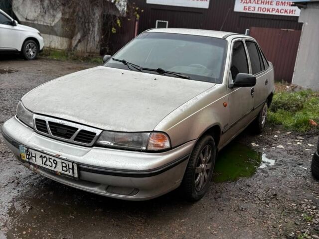 Серый Дэу Нексия, объемом двигателя 1.5 л и пробегом 250 тыс. км за 1250 $, фото 1 на Automoto.ua
