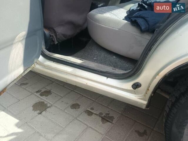 Сірий Деу Нексія, об'ємом двигуна 1.5 л та пробігом 144 тис. км за 1328 $, фото 11 на Automoto.ua