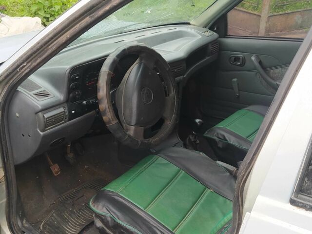 Серый Дэу Нексия, объемом двигателя 1.5 л и пробегом 334 тыс. км за 334 $, фото 13 на Automoto.ua