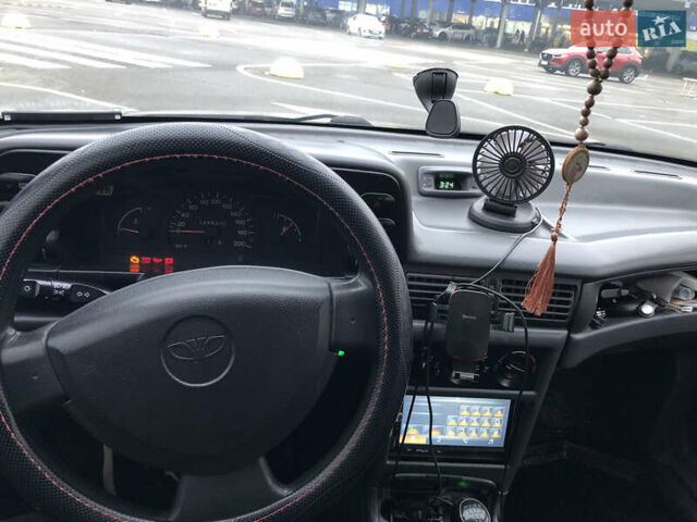 Сірий Деу Нексія, об'ємом двигуна 1.5 л та пробігом 330 тис. км за 1650 $, фото 12 на Automoto.ua