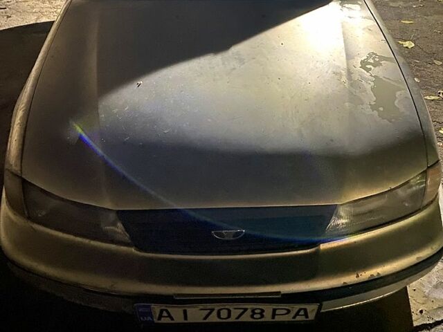 Сірий Деу Нексія, об'ємом двигуна 1.5 л та пробігом 350 тис. км за 1000 $, фото 4 на Automoto.ua