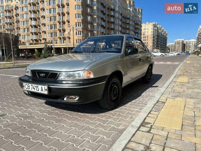 Серый Дэу Нексия, объемом двигателя 1.5 л и пробегом 152 тыс. км за 1900 $, фото 3 на Automoto.ua