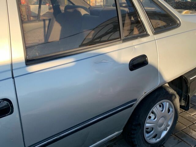 Сірий Деу Нексія, об'ємом двигуна 1.5 л та пробігом 132 тис. км за 1500 $, фото 9 на Automoto.ua