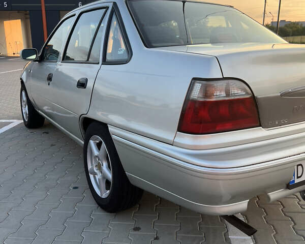 Сірий Деу Нексія, об'ємом двигуна 1.5 л та пробігом 300 тис. км за 1850 $, фото 7 на Automoto.ua