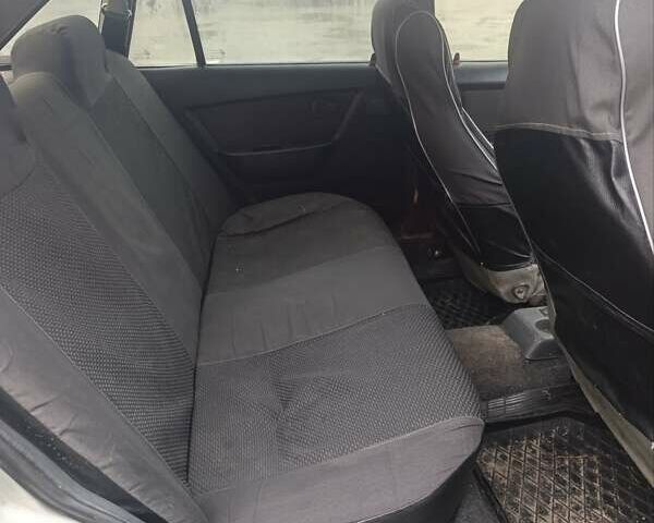 Сірий Деу Нексія, об'ємом двигуна 1.5 л та пробігом 200 тис. км за 800 $, фото 8 на Automoto.ua