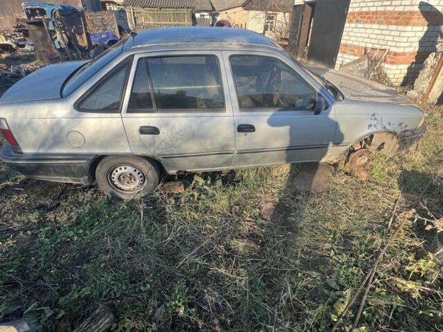 Сірий Деу Нексія, об'ємом двигуна 1.5 л та пробігом 77 тис. км за 566 $, фото 4 на Automoto.ua