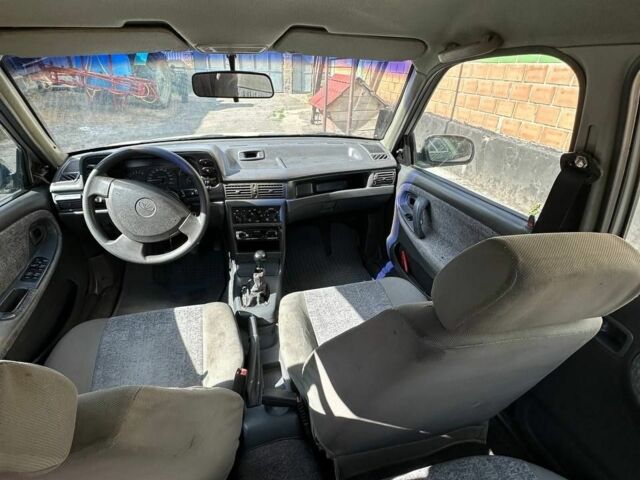 Сірий Деу Нексія, об'ємом двигуна 1.5 л та пробігом 185 тис. км за 700 $, фото 9 на Automoto.ua