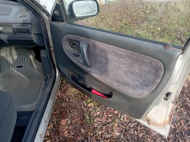 Серый Дэу Нексия, объемом двигателя 1.6 л и пробегом 136 тыс. км за 942 $, фото 4 на Automoto.ua