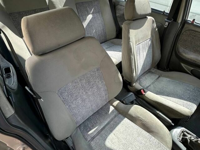 Сірий Деу Нексія, об'ємом двигуна 1.5 л та пробігом 185 тис. км за 700 $, фото 14 на Automoto.ua