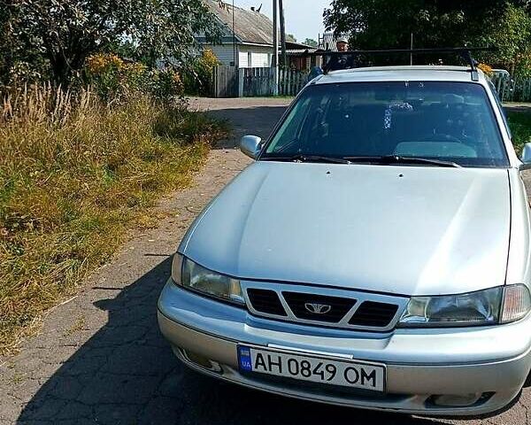 Сірий Деу Нексія, об'ємом двигуна 1.5 л та пробігом 157 тис. км за 2000 $, фото 1 на Automoto.ua