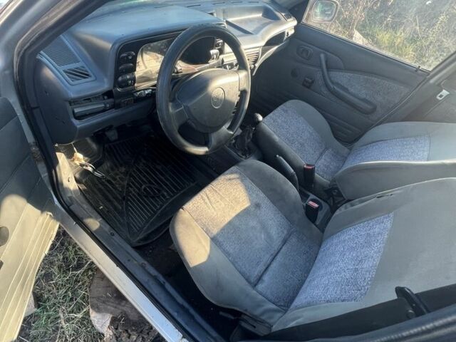 Сірий Деу Нексія, об'ємом двигуна 1.5 л та пробігом 77 тис. км за 566 $, фото 1 на Automoto.ua