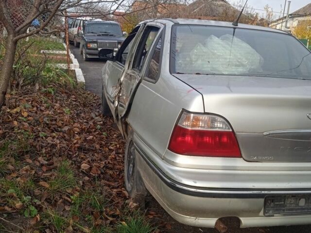 Сірий Деу Нексія, об'ємом двигуна 1 л та пробігом 288 тис. км за 355 $, фото 7 на Automoto.ua