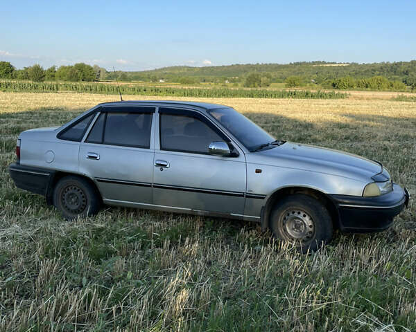 Серый Дэу Нексия, объемом двигателя 1.6 л и пробегом 250 тыс. км за 1999 $, фото 11 на Automoto.ua