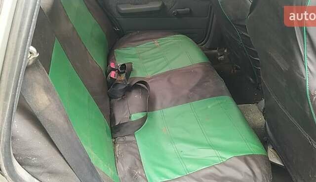 Серый Дэу Нексия, объемом двигателя 1.5 л и пробегом 334 тыс. км за 329 $, фото 22 на Automoto.ua