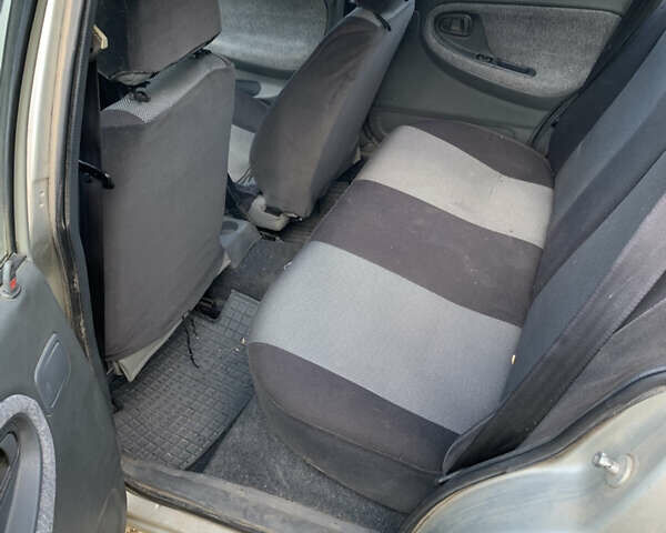 Сірий Деу Нексія, об'ємом двигуна 1.5 л та пробігом 130 тис. км за 2300 $, фото 9 на Automoto.ua